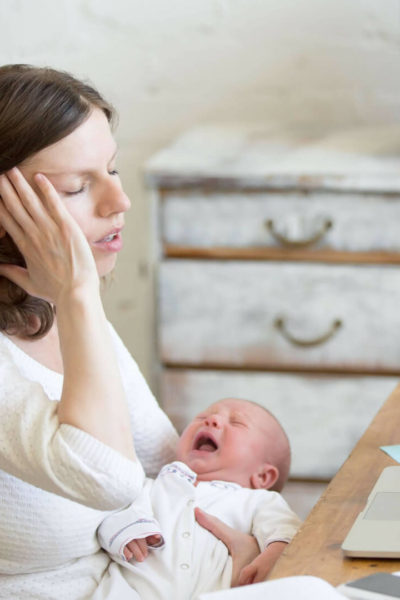 Frustrated mom trying to start a baby routine